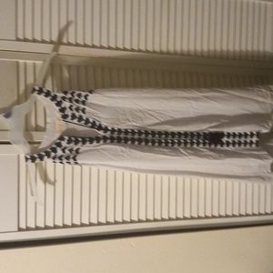 Altart State stand out for good white sleeveless dress with lace design V-Neck